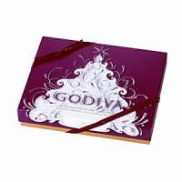 Celebrate the holidays with an assortment of decadent Godiva chocolates packaged in a whimiscal-themed red box. The 16 piece classic Belgian chocolate assortment includes everyday and limited edition seasonal truffles.