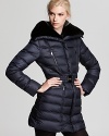 A plush collar lined in rabbit fur brings a glamourous finish to this winter-essential puffer coat from Dawn Levy.