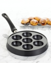 Pancakes couldn't get any better until now with a pan that makes 7 filled pancakes with ease. Pick your favorite batter and add your favorite filling-fruit, jam, chocolate and more-for a pastry cooked to perfection. Limited lifetime warranty.