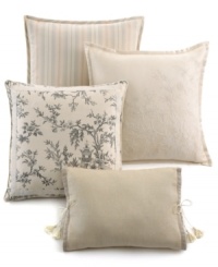 Refined tradition. Elegant velvet ribbon and tassel detailing add touches of modern romance to this cream cotton decorative pillow from Lauren Ralph Lauren. (Clearance)