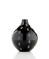 Laced with wedge cuts in black crystal, the Stitch vase from Sasaki lends minimalist allure to modern interiors.