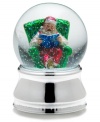 Santa Claus kicks back with a good book, full of beautiful Christmas stories, in this musical snow globe from Towle.