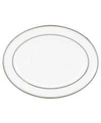 Set the table with poise and purpose. The Library Lane collection features tailored platinum bands on white china that bring black tie elegance to any meal. Oval platter not shown.