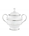 A sweet lace pattern combines with platinum borders to add graceful elegance to your tabletop. The classic shape and pristine white shade make this sugar bowl a timeless addition to any meal. From Lenox's dinnerware and dishes collection.