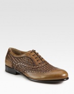 Charming woven detail makes this lace-up design one step ahead of rest, crafted in Italian leather.Leather upperPadded insoleLeather soleMade in Italy