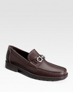 A classic leather loafer, expertly constructed in Italy from premium leather with a silvertone accent and signature lug sole. Leather lining Padded insole Rubber sole Made in Italy