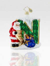 Handcrafted of ornate European glass, a brilliantly colored Santa reenacts one of our favorite Christmas scenes. Hand-blownHand-painted4 highMade in Poland