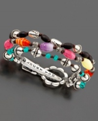 Clip on this colorful bracelet by Lucky Brand Jeans and get ready to take off! Set in brass and vintage silver-plated metal, this bracelet features wood & glass beads with a unique logo-inscribed clip at clasp. Approximate length: 8 inches.