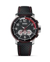 Inspired by the outlook of motorsport cockpits, this chronograph watch features three interconnected counters and black perforated silicone strap with red stitching for a distinctive sporty design. From HUGO BOSS.