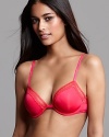 A sexy mid-coverage bra with delicate lace trim along neckline and logo embossed straps. Style #F3264