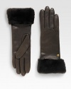 Durable deerskin leather accented with luxurious cashmere lining and shearling sheepskin cuff.Metal logo detailAbout 11 longSpecialist dry cleanImportedFur origin: Spain