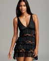 Show off your figure in this sheer, lace chemise with flattering tiered ruffles from In Bloom by Jonquil.