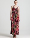 A rush of tropical florals, this Calvin Klein maxi dress blends prints big and small for the perfect fashion mash-up.