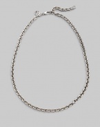 Simple and sophisticated, a bold chain of sterling silver with a signature tag at the clasp. Sterling silver Length, about 20 Lobster clasp Made in Bali