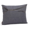 An asymmetrical pleat and zipper adds rock and roll edge to this blue denim decorative pillow.