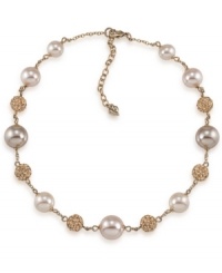 Elegance at its best. Carolee's beautiful illusion necklace combines glass pearls and crystal fireballs in 12k gold-plated mixed metal. Approximate length: 16 inches + 2-inch extender.