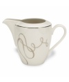 Sweet yet sophisticated, a loopy ribbon design sweeps across this porcelain creamer from Mikasa. Complete with a sparkling platinum rim, this flirty pattern captivates everyone at your dinner table.