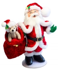 Santa at his best. The jolliest man on Christmas dons a red velour suit and bag of toys and treats in this quintessential holiday figurine. With the soft features and unmistakable style of Annalee dolls.