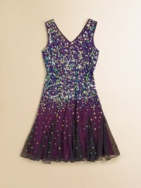 She'll be a real showstopper in this glitzy, sequined frock with full skirt, perfect for twirling and dancing.V-neckSleevelessPullover styleFull skirtFully linedPolyesterDry cleanImported