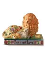 Jim Shore's lion and lamb collectible figurine, inscribed with Peace and Love, inspires a moment reflection on the true meaning of the holiday season.