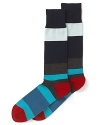 An energetic stripe design sets the tone with exciting color on these soft, comfortable socks from Paul Smith.