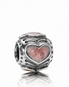 A finely detailed sterling silver charm with heart motifs in rose enamel. By PANDORA.