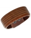 No frills, but plenty of thrills. Fossil's men's bracelet is crafted from brown leather to give it a rugged appeal. Adjusts to fit wrist. Approximate length: 7-7-3/4 inches.