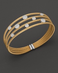 From the Classique collection, a white gold and yellow PVD cable cuff with round diamond stations. Designed by Charriol.