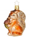 Nutty about Christmas! As cute as can be, this Inge-Glas squirrel ornament is mouth-blown and hand-painted for a signature, well-crafted look.