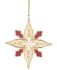 Crafted of lovely porcelain with gold and red embellishments, this star ornament sparkles upon your tree for an opulent look. From Lenox.