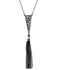 Ornate elegance. This Y-shaped necklace from GUESS is crafted from hematite-tone mixed metal with a glass crystal tassel and a filigree pattern for a refined touch. Approximate length: 18 inches + 2-inch extender. Approximate drop: 6-1/2 inches. Approximate diameter: 1/2 inch.