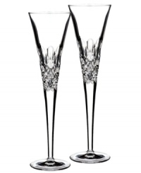 Crystal couture. Monique Lhuillier's Ellypse flutes balance a minimalist stem with a pattern of intersecting cuts and rounded scoops in sumptuous Waterford crystal.