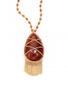 THE LOOKPendant designWire-wrapped orange rutilated quartz and carnelian accents Tassel details on pendant19 tcw14k goldfilled settingTHE MEASUREMENTPendant drop, about 2½Length, about 19ORIGINImported