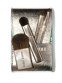 Perfectly packable in a metallic, faux-leather case-- whether you're headed out of town or just a night on the town, our Mini Brush Set features full-sized brush heads in a new slimline design for a flawless finish wherever you go. Set includes: Four brushes: Blush, Eye Sweep, Angle Eye Shadow, and Ultra Fine Eye Liner all in a compact case. There's a handy compartment in the case designed to hold our Desert Twilight Eye Palette, too.