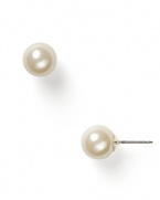 Add a classic accent to your look with these glass pearl stud earrings from Lauren Ralph Lauren.