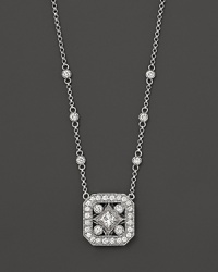 Brilliant diamonds in a 14K. white gold chain recall glamourous art deco style.