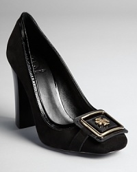 A squared logo plate lends a 60s feel to Tory Burch's retro-inspired Julian pumps, dressed up with patent piping.