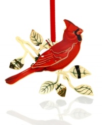 The cardinal has long been a symbol of Christmas cheer and ChemArt presents this beautifully detailed crimson bird atop a golden bough as an eye-catching ornament. In 24k gold-plated brass.