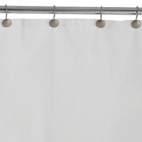 Two flaps hold this shower liner in place along the tub wall.