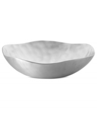 Handcrafted in aluminum alloy with an organic shape and brushed finish, the Dimension bowl from Donna Karan Lenox lends a serene, dreamy quality to modern tables.