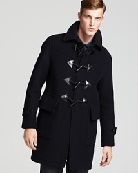 Exude classic winter style with this plush Burberry London toggle coat in a luxe wool blend.