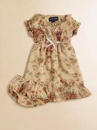 An adorable floral-patterned dress is rendered in light chiffon with a ruffled hem for charm that transcends the seasons.Ruffled CrewneckShort ruffled sleevesButton-frontElasticized waist with ribbonRuffled hemPolyesterMachine washImported Please note: Number of buttons may vary depending on size ordered. 