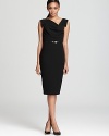 This Black Halo dress lends an ultra-sophisticated look with a waist-defining belt and office-ready sheath silhouette.