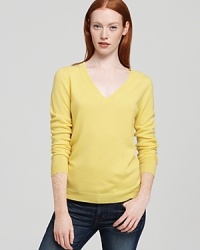 Rendered in luxe-touch cashmere, this sunny-hued Theory sweater, is a classic must-have look for your year-round wardrobe.