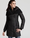 Cable knit details lends extra cozy style to this plush down puffer coat from Mackage.