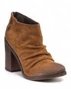 Soft, scrunched suede slouches atop a chunky heel for a chic, easygoing take on the classic cowboy boot. By Boutique 9.