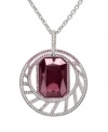 Romancing the stone: Swarovski's circle and stone pendant necklace showcases a faceted crystal in rich red, elegantly encased inside a glittering circle of crystals. Made in silver tone mixed metal. Approximate length: 27 inches. Approximate drop: 1-3/4 inches.