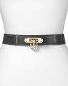 Accented by rich leather with a bold logo-trimmed buckle, this belt from Tory Burch effortlessly defines every outfit with the brand's polished style.