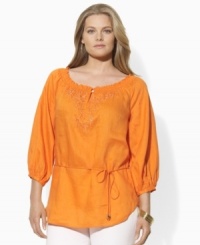 A gracefully smocked neckline and bold floral embroidery impart boho-chic style to this plus size Lauren by Ralph Lauren tunic in light-as-air linen.