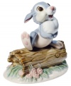 Bambi's pal, Thumper, lifts a foot to perform his signature thump-on-a-log move in this handcrafted porcelain figurine from Nao by Lladro.